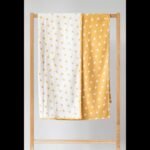 Žaismingas, geltonas-baltas žakardinis dvipusis rankšluostis PIED-DE-POULE 100x180